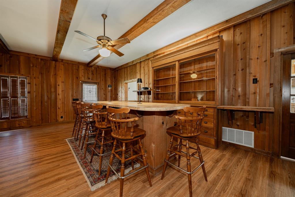 809 Cobb Street Bridgeport, TX 76426 - Photo 6 of 39 a view of a dining room with furniture and wooden floor