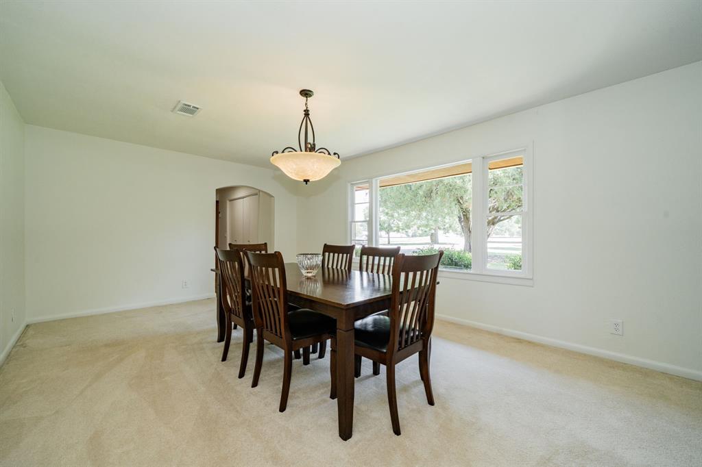 809 Cobb Street Bridgeport, TX 76426 - Photo 10 of 39 a view of a dining room with furniture window and outside view