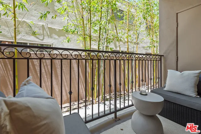 a view of a porch with furniture