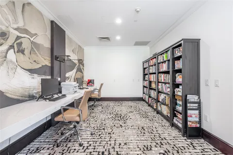 a view of a lake with tall buildings