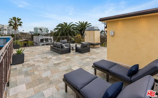 a view of multiple house with a porch