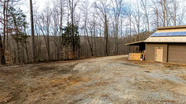 a house view with a backyard space