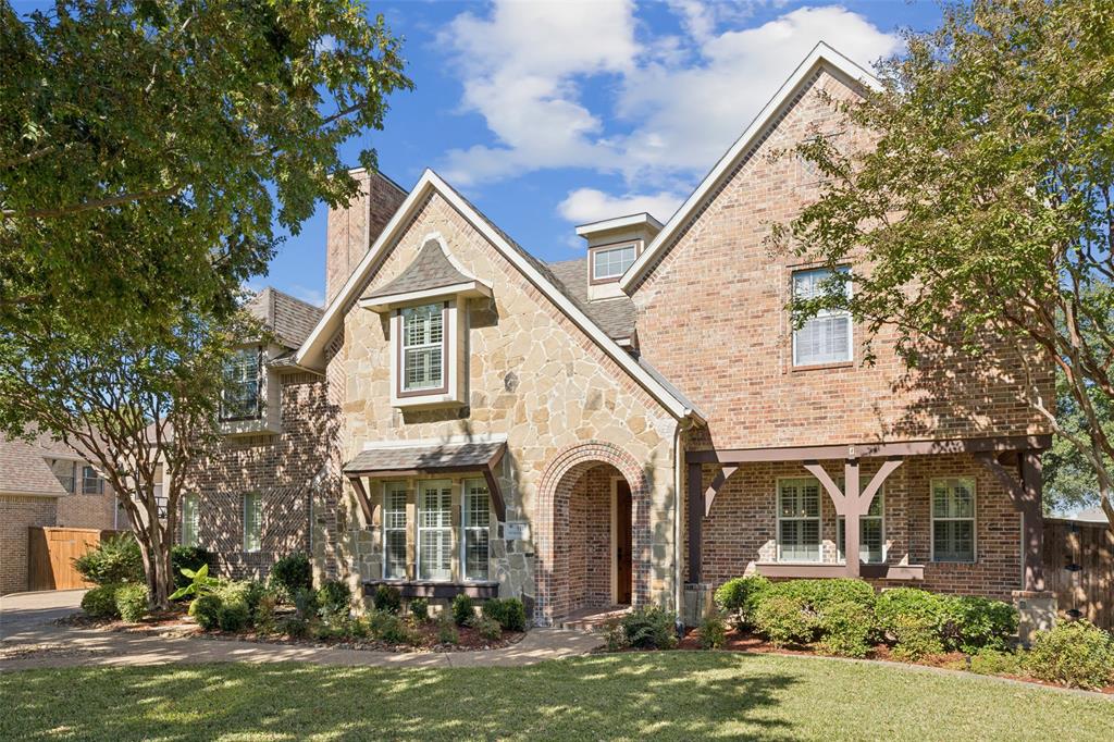 511 Mockingbird Drive Murphy, TX 75094 - Photo 1 of 37 a front view of a house with a yard