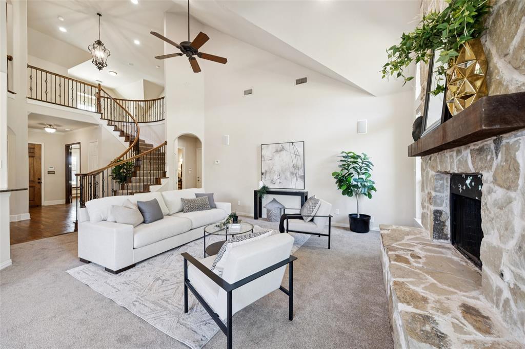 511 Mockingbird Drive Murphy, TX 75094 - Photo 6 of 37 a living room with furniture flower pot and a chandelier