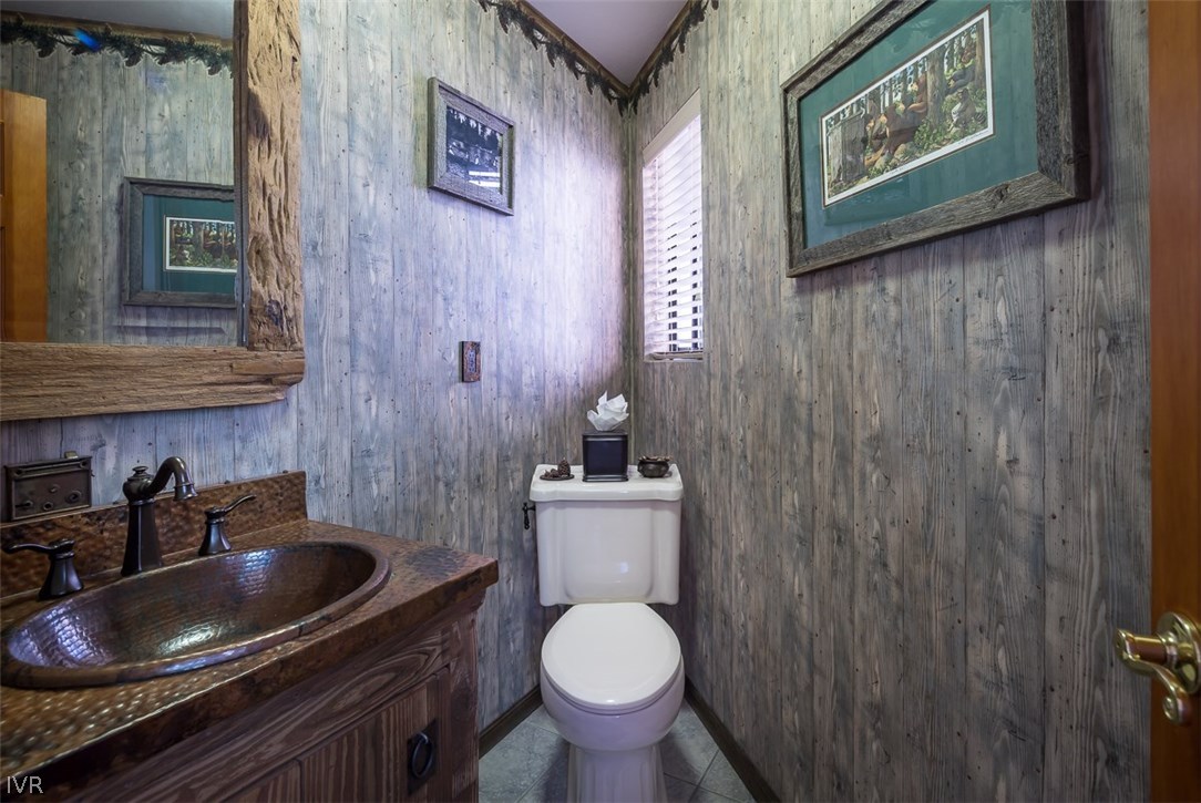 583 Fallen Leaf Way Incline Village, NV 89451 - Photo 14 of 30 a bathroom with a toilet sink and mirror