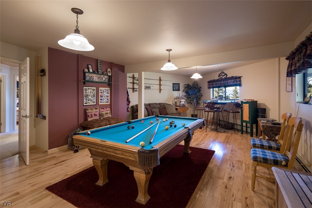 583 Fallen Leaf Way Incline Village, NV 89451 - Photo 9 of 30 a room with wooden floor pool table and windows