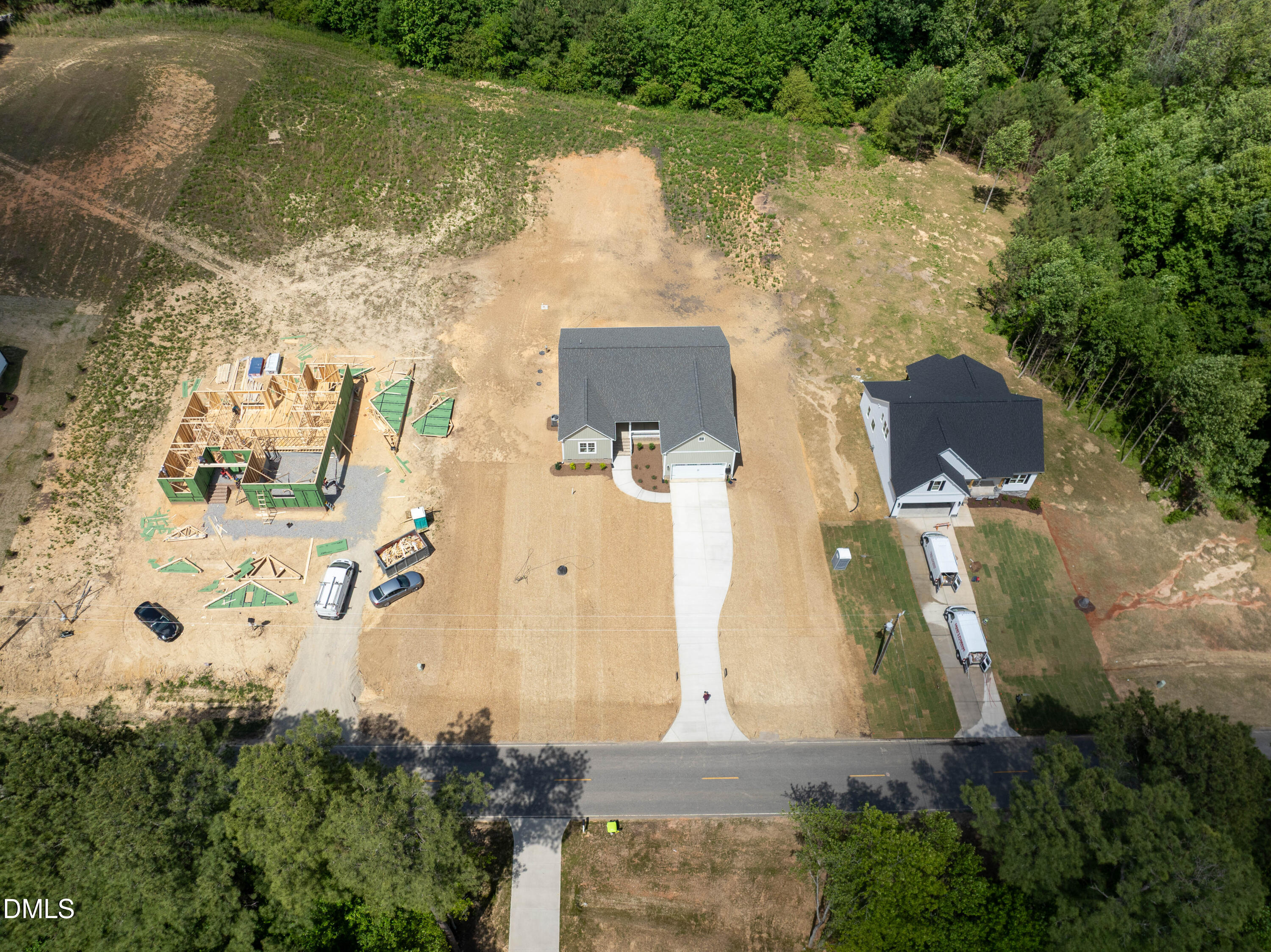2275 Peachtree Hills Road Spring Hope, NC 27882 - Photo 39 of 43 an aerial view of residential houses with outdoor space and swimming pool