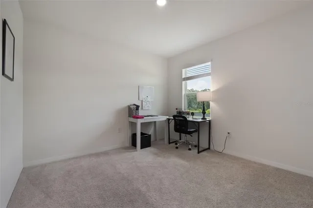 a room with furniture and a window