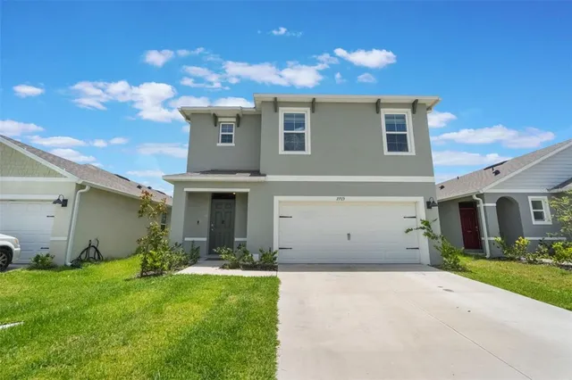 a house view with a garden space