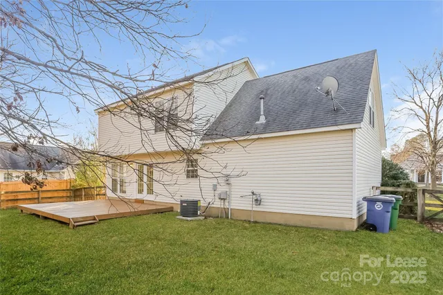 a view of backyard with a small cabin