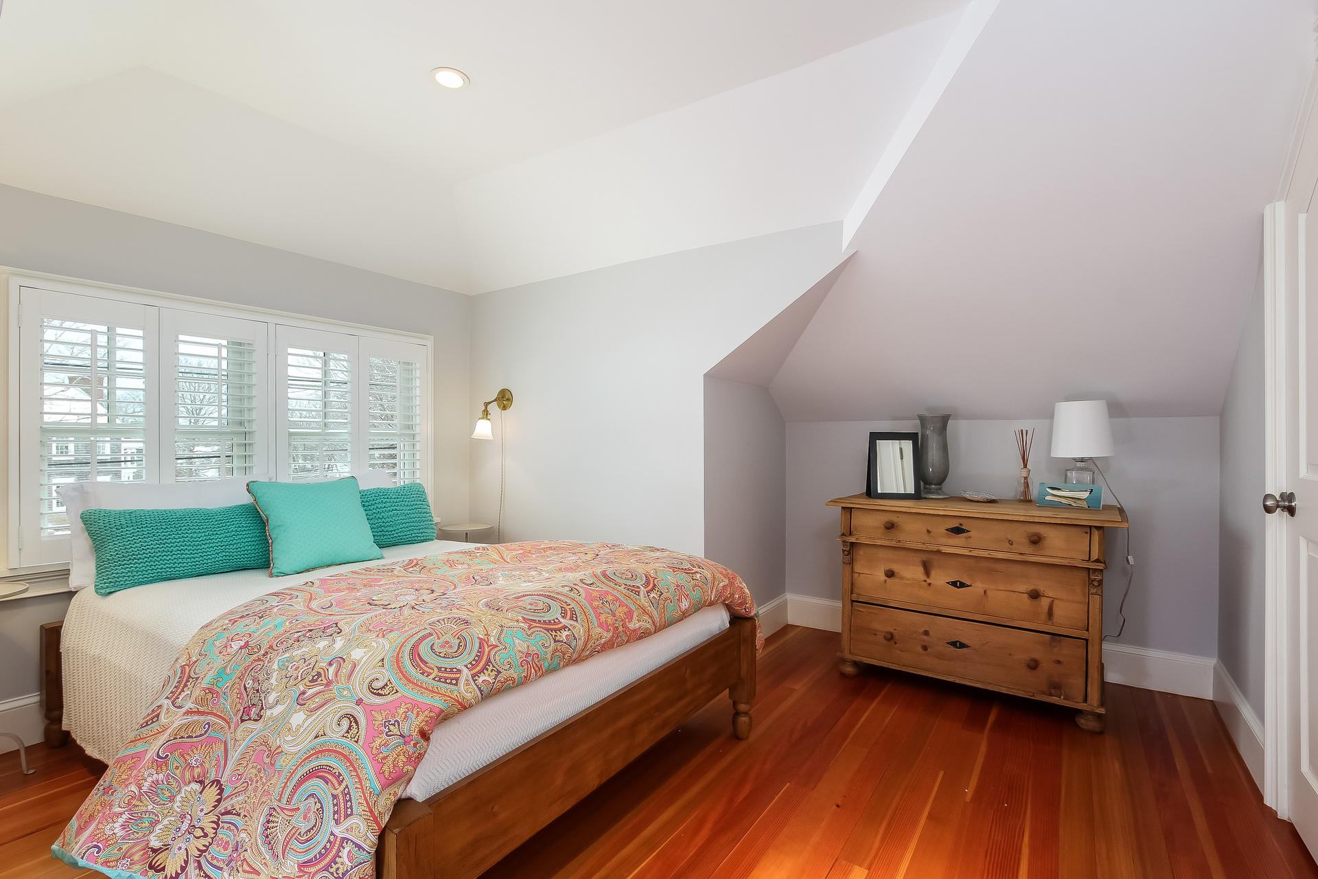 38 Mill Pond Road Chatham, MA 02633 - Photo 16 of 30 a bedroom with a bed and a dresser next to a window