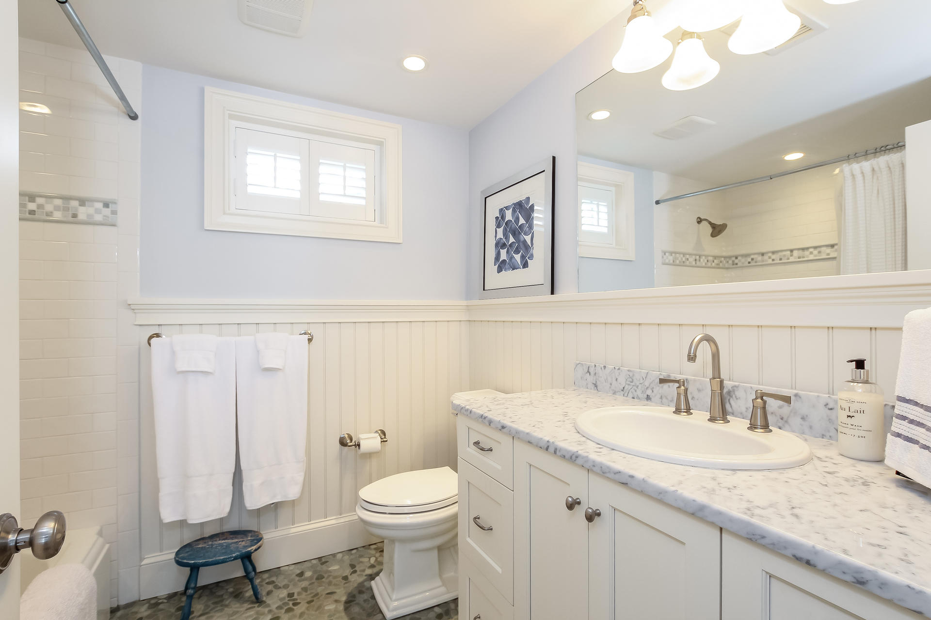 38 Mill Pond Road Chatham, MA 02633 - Photo 22 of 30 a bathroom with a granite countertop sink mirror and toilet