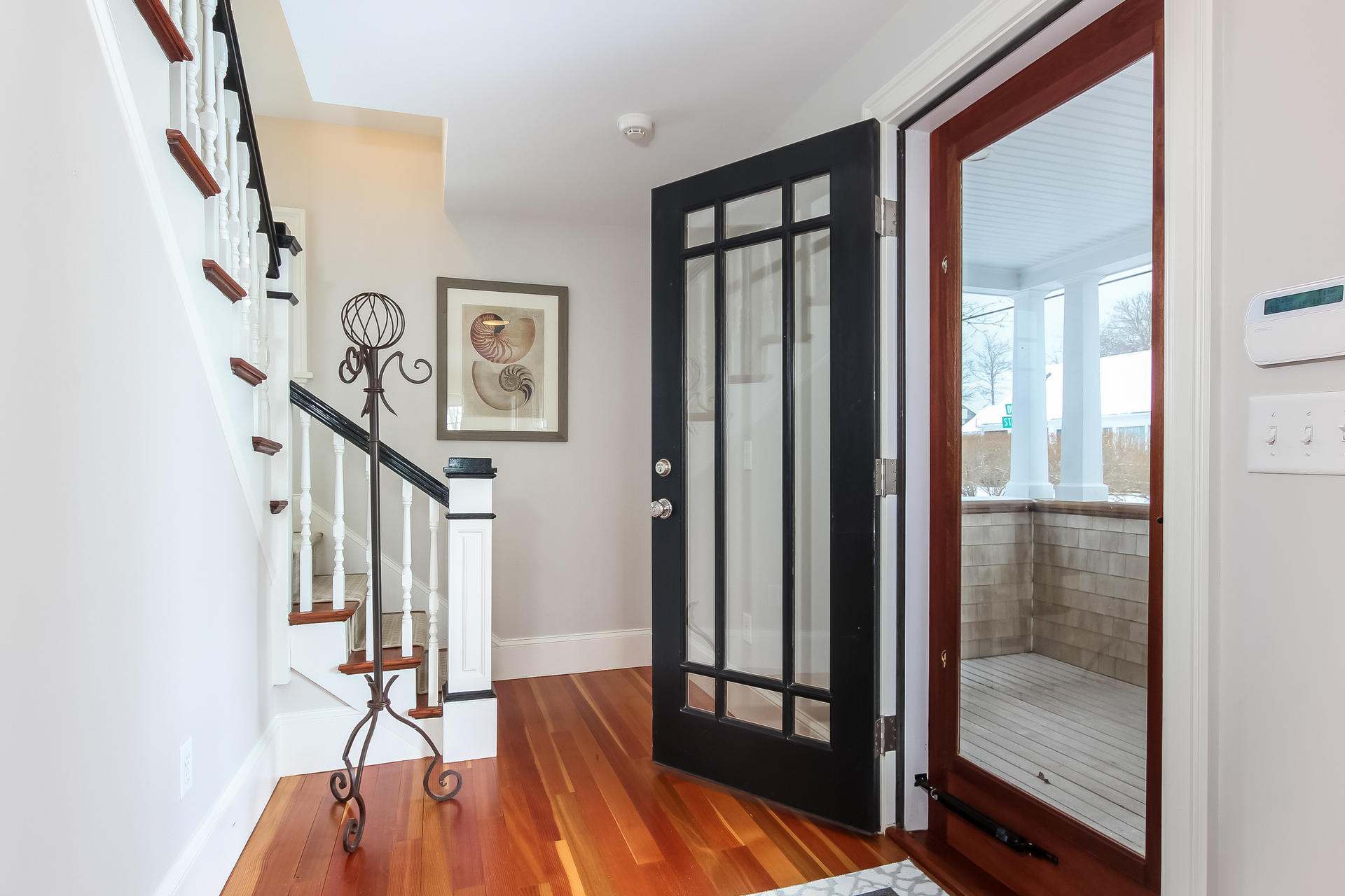 38 Mill Pond Road Chatham, MA 02633 - Photo 3 of 30 a view of a hallway with wooden floor and entryway