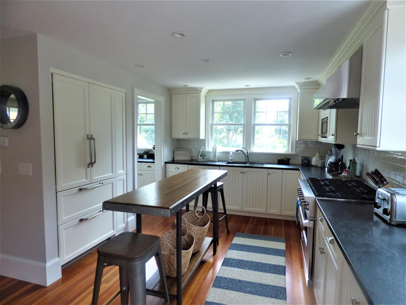 38 Mill Pond Road Chatham, MA 02633 - Photo 6 of 30 a kitchen with sink refrigerator and window