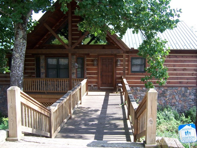 268 Old Megs Lane Boone, NC 28607 - Photo 1 of 12 a view of a roof deck with wooden fence and a large tree