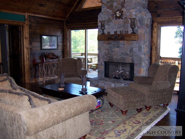 268 Old Megs Lane Boone, NC 28607 - Photo 11 of 12 a living room with furniture and a fireplace