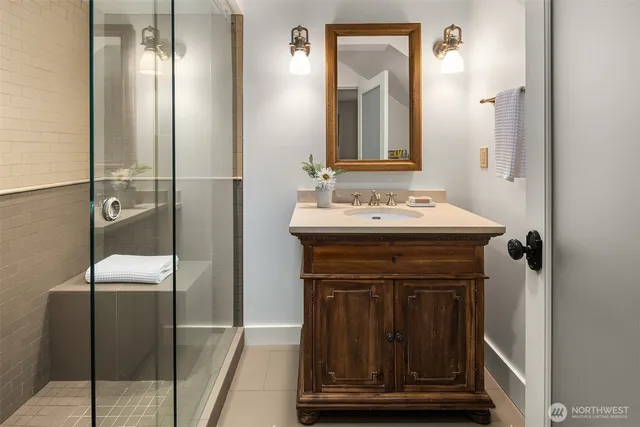a utility room with sink dryer and washer