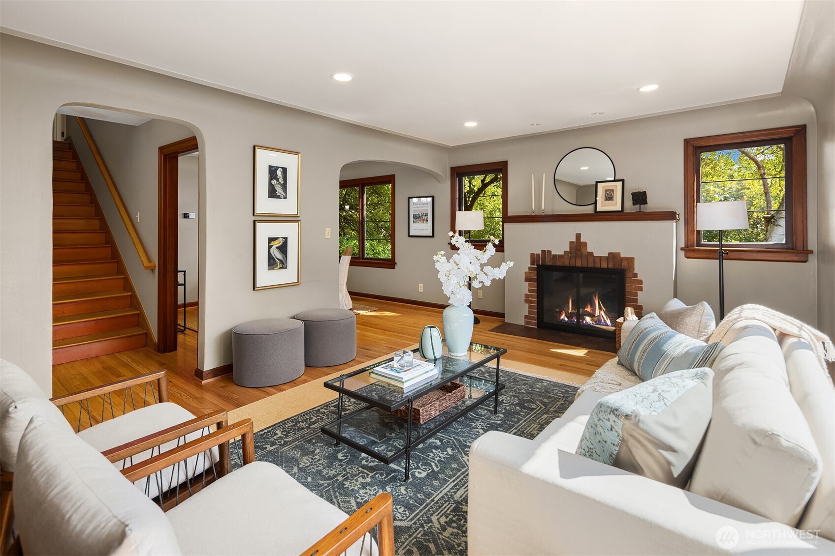 3322 East Terrace Street Seattle, WA 98122 - Photo 5 of 39 a living room with furniture a window and a fireplace