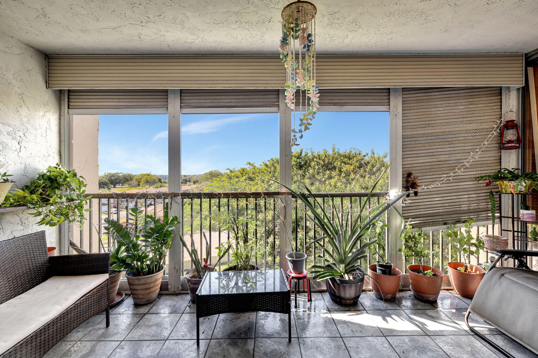 3910 Inverrary Boulevard, Unit 601B Lauderhill, FL 33319 - Photo 12 of 56 a building outdoor space with potted plants