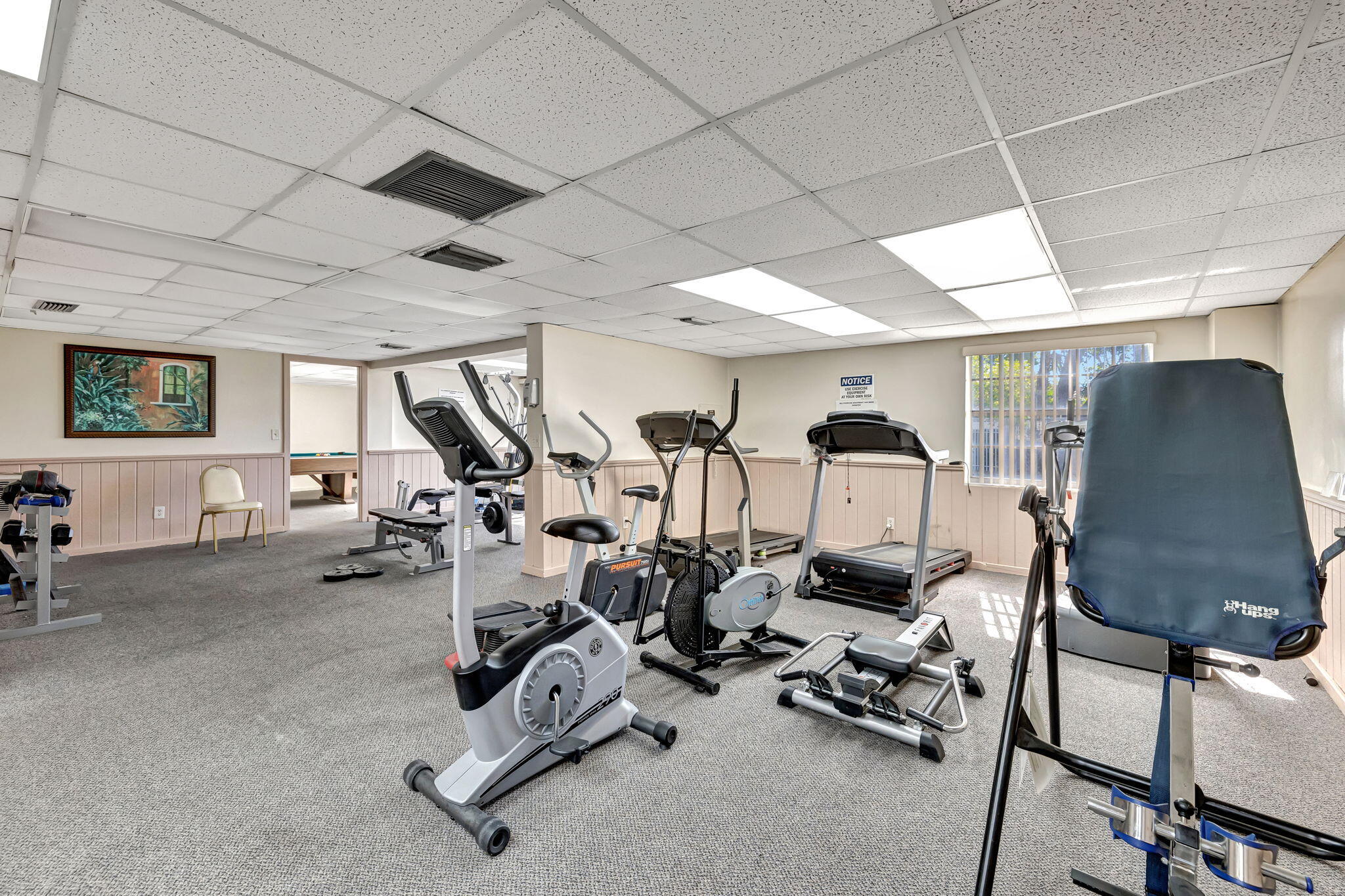 3910 Inverrary Boulevard, Unit 601B Lauderhill, FL 33319 - Photo 45 of 56 a view of a room with gym equipment