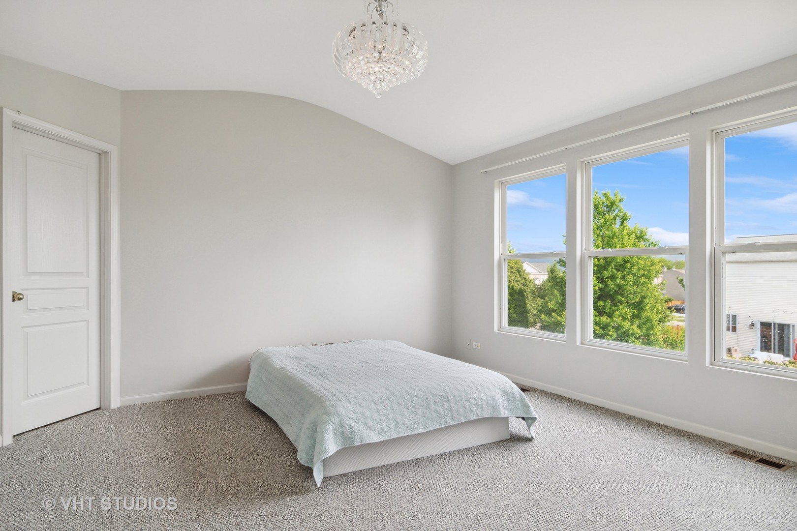 11751 Glenn Circle Plainfield, IL 60585 - Photo 11 of 19 a spacious bedroom with a bed and a window