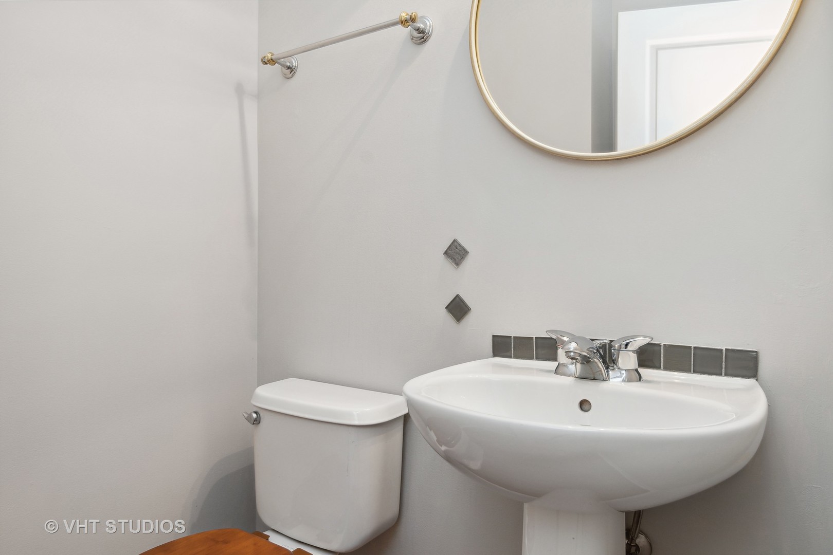 11751 Glenn Circle Plainfield, IL 60585 - Photo 17 of 19 a bathroom with a sink a mirror and a toilet