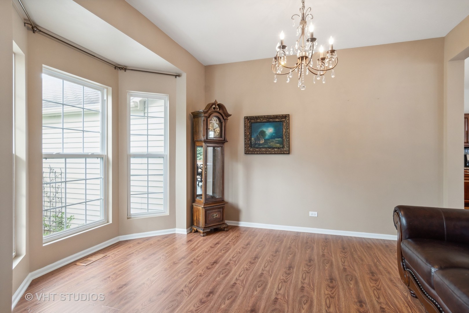 11751 Glenn Circle Plainfield, IL 60585 - Photo 7 of 19 a view of livingroom with hardwood floor and window
