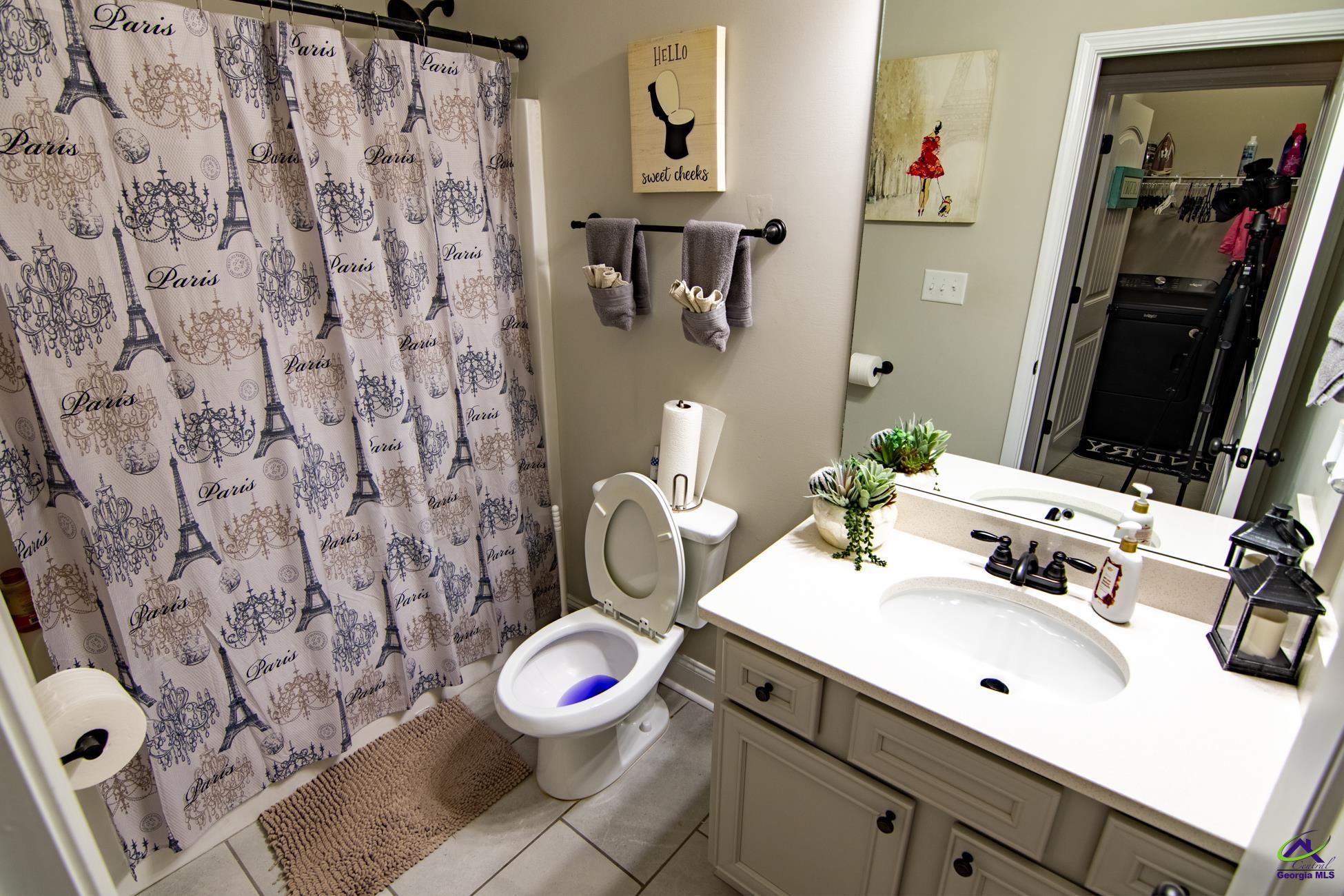 123 Logan's Mill Trail Warner Robins, GA 31093 - Photo 19 of 23 a bathroom with a sink toilet and shower