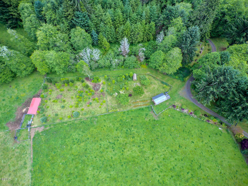 847 Hamer Road Siletz, OR 97380 - Photo 74 of 79 Aerial of fruit trees/sheds