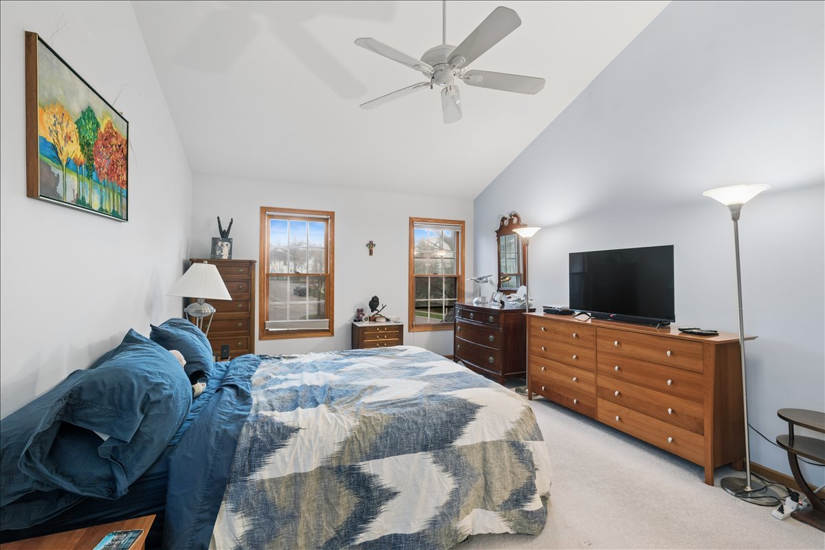 602 Birch Lane Fox River Grove, IL 60021 - Photo 18 of 37 a bedroom with a bed and wooden floor