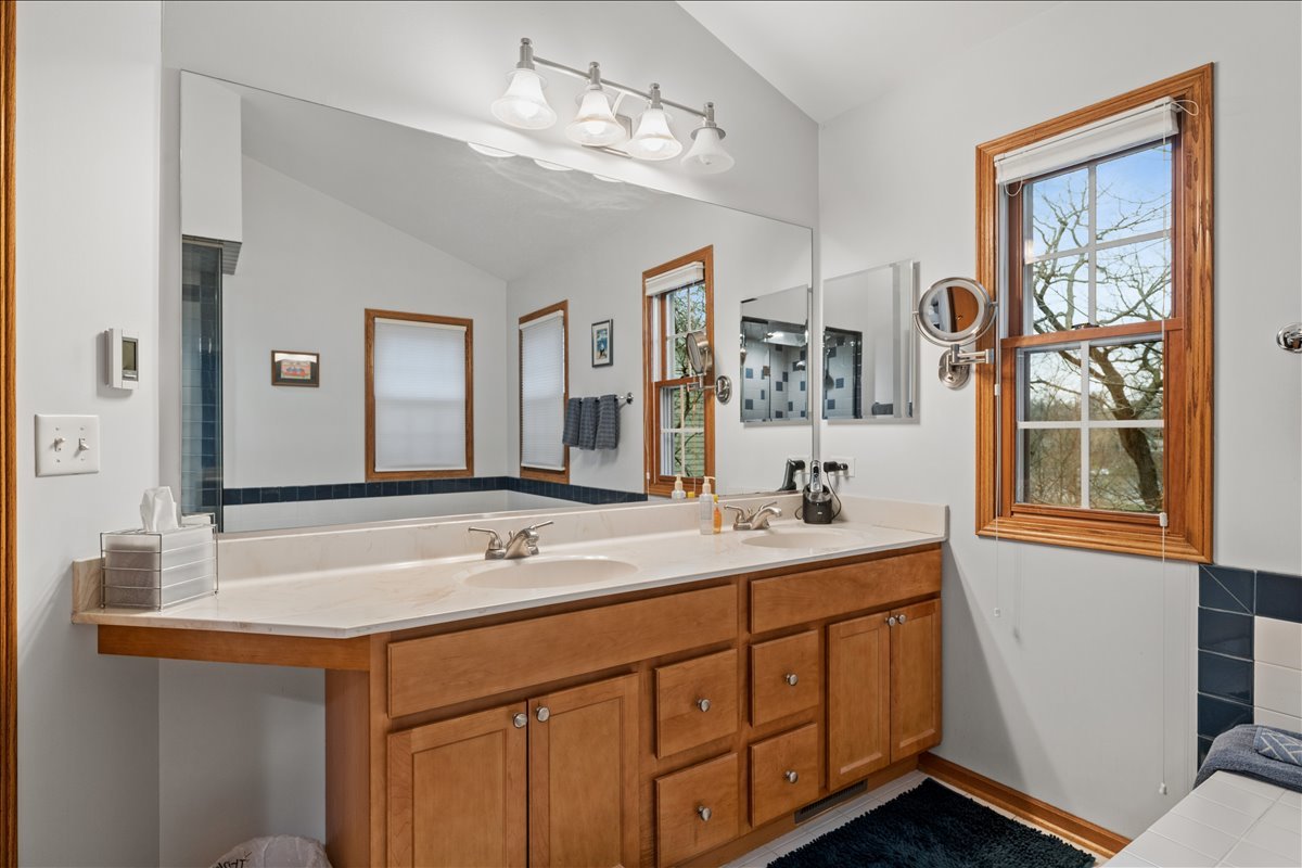 602 Birch Lane Fox River Grove, IL 60021 - Photo 20 of 37 a bathroom with a sink double vanity and a mirror