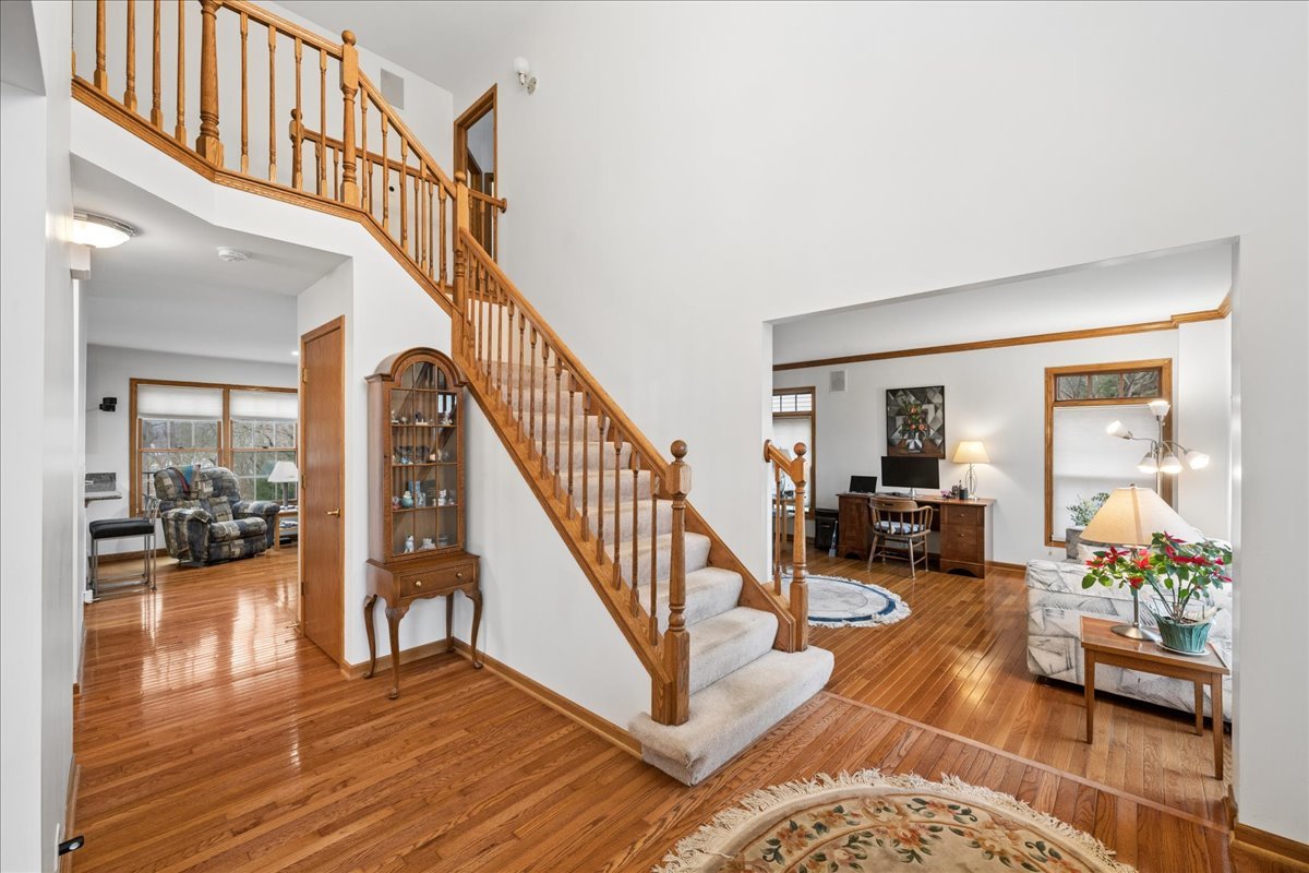 602 Birch Lane Fox River Grove, IL 60021 - Photo 2 of 37 a view of entryway livingroom and hall with wooden floor