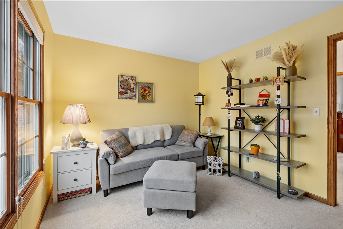 602 Birch Lane Fox River Grove, IL 60021 - Photo 22 of 37 a living room with furniture and a window