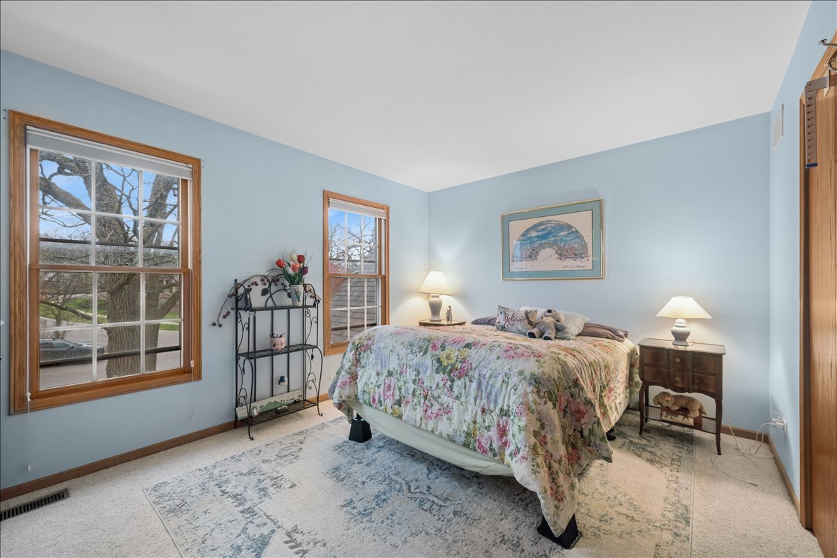 602 Birch Lane Fox River Grove, IL 60021 - Photo 23 of 37 a bedroom with a bed and a window