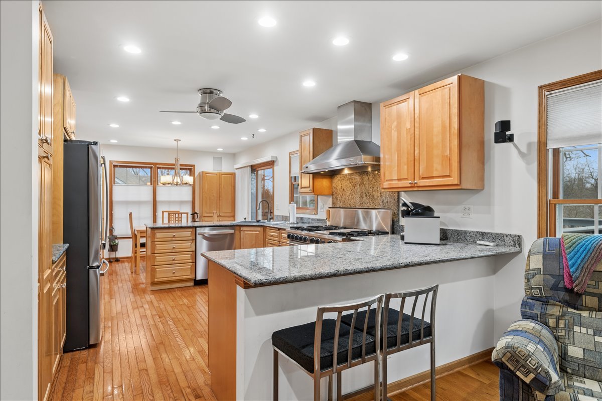 602 Birch Lane Fox River Grove, IL 60021 - Photo 5 of 37 a kitchen with granite countertop a sink appliances counter top space and furniture