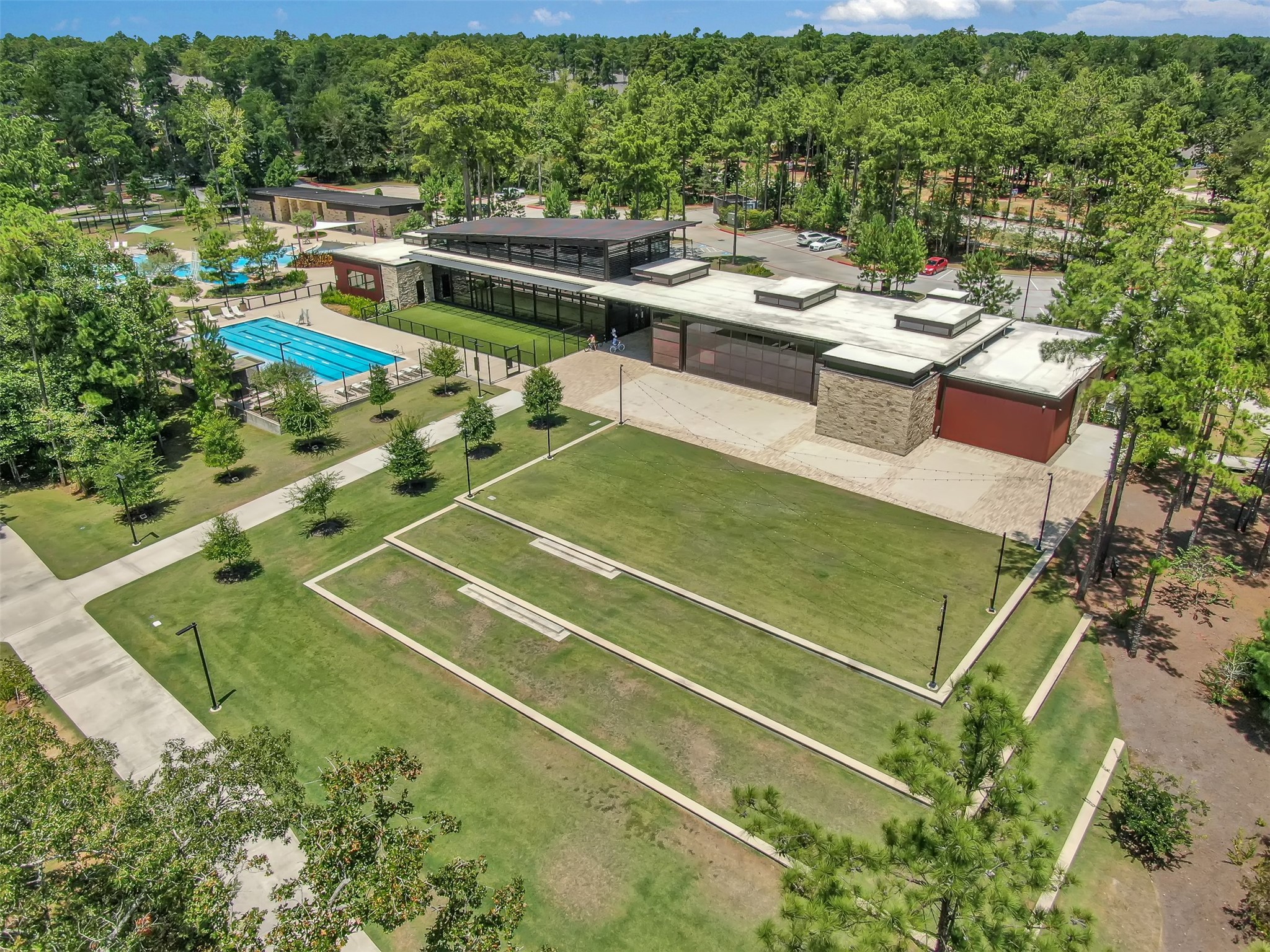 111 Yellow Perch Way Conroe, TX 77318 - Photo 27 of 35 Founders Park Event Lawn, a vibrant community gathering space that hosts concerts, movies, holiday celebrations, and other HOA-sponsored events throughout the year.