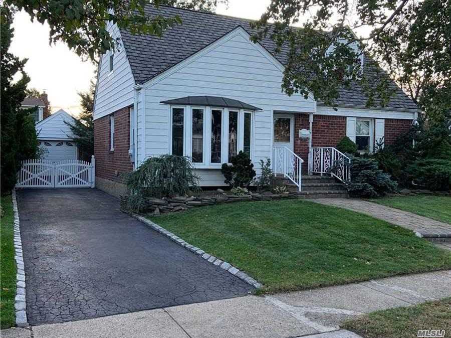 472 Emory Road Mineola, NY 11501 - Photo 1 of 1 a view of a house with back yard