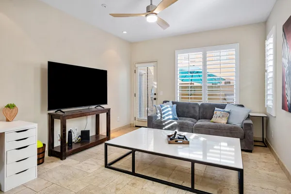 a view of room with furniture window and wooden floor