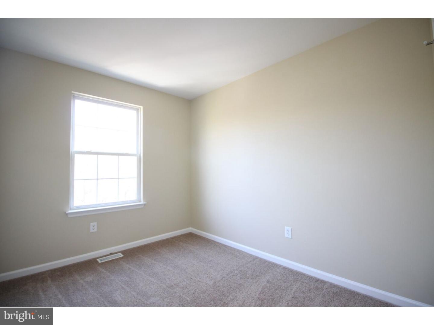 13 Millstream Road Pine Hill, NJ 08021 - Photo 15 of 22 an empty room with a window