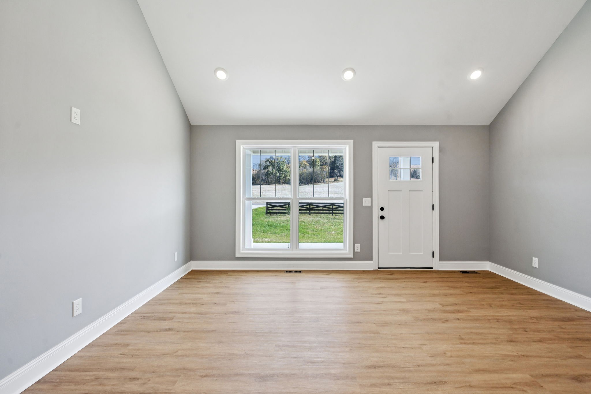 1578 Big Dry Creek Road Pulaski, TN 38478 - Photo 19 of 45 wooden floor in an empty room with a window