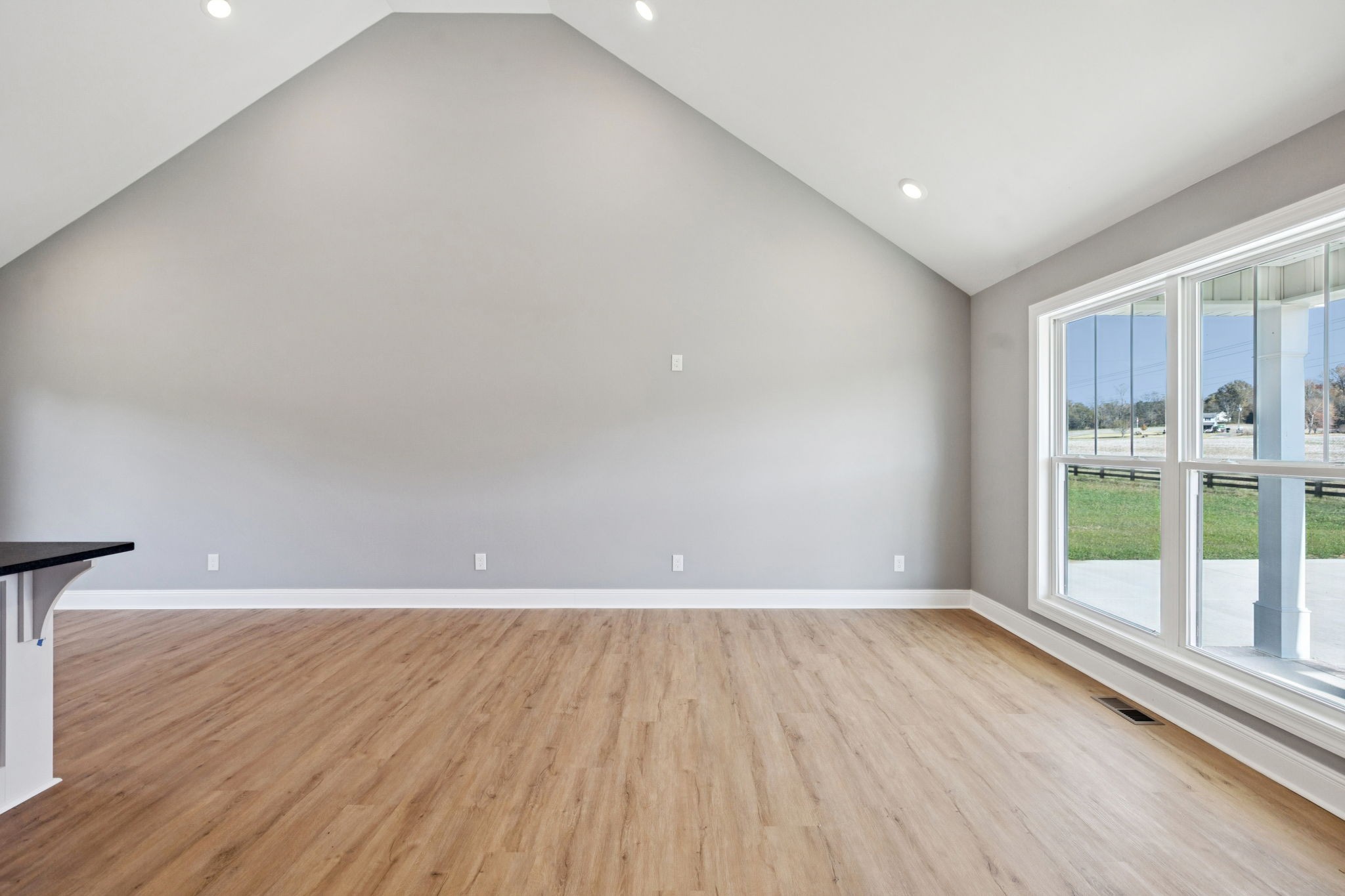1578 Big Dry Creek Road Pulaski, TN 38478 - Photo 21 of 45 wooden floor in an empty room with a window