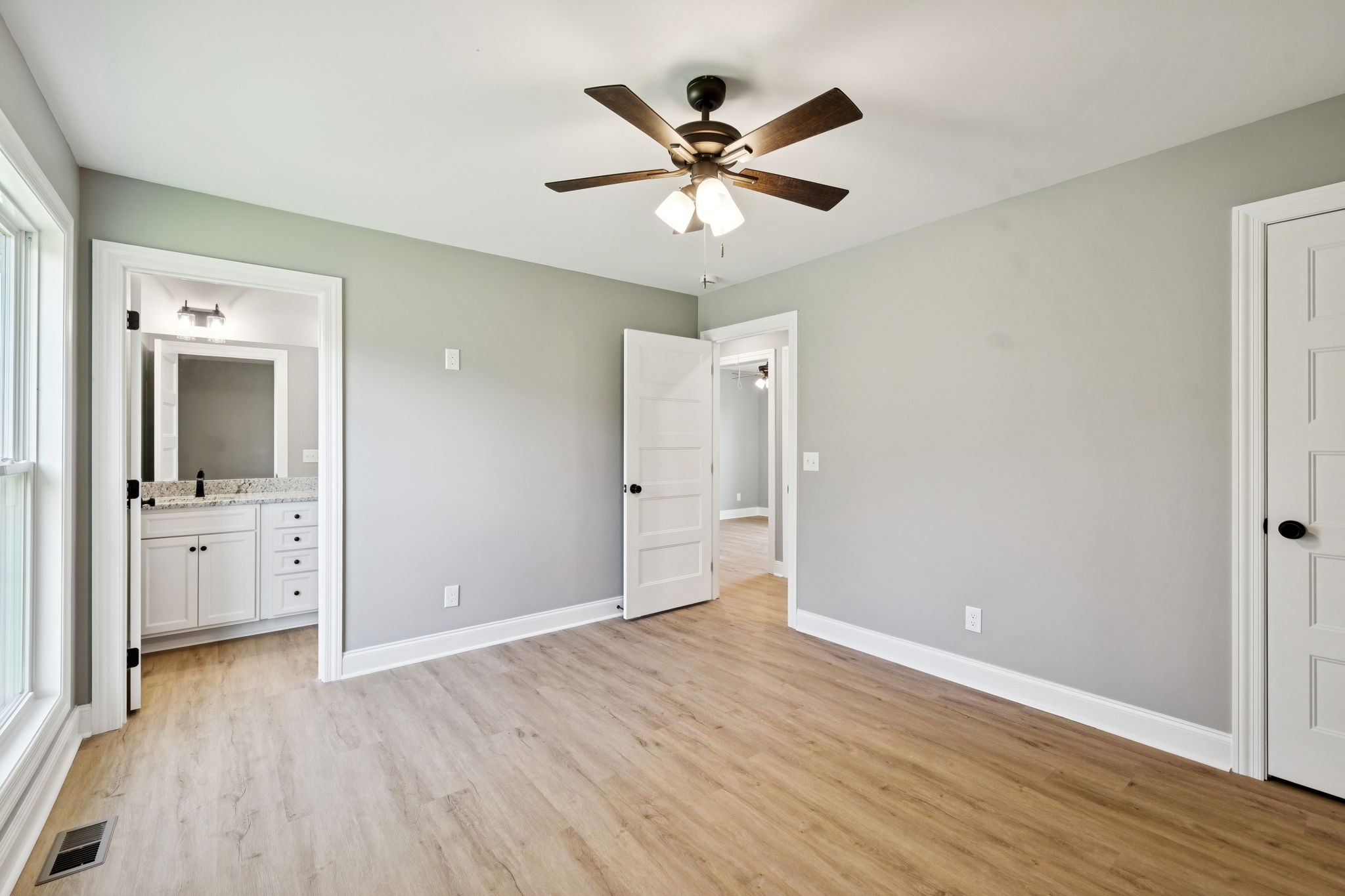 1578 Big Dry Creek Road Pulaski, TN 38478 - Photo 31 of 45 wooden floor in an empty room with a window