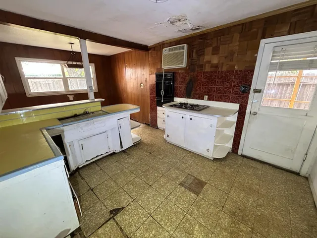 a room with sink and window