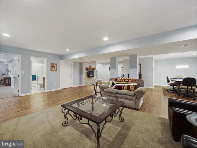 a view of a house with backyard and porch