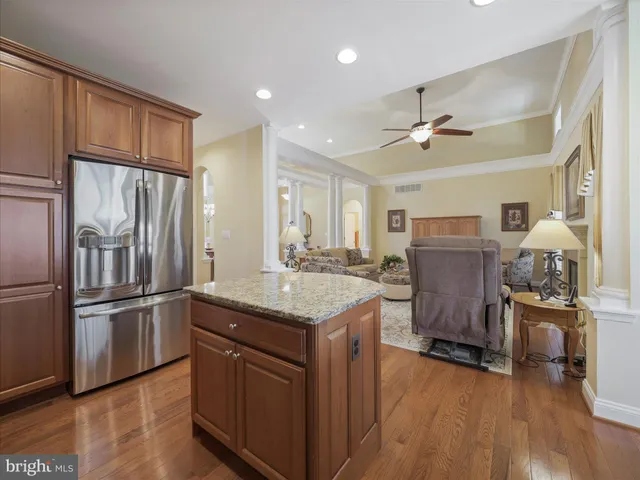 a kitchen with cabinets and stainless steel appliances