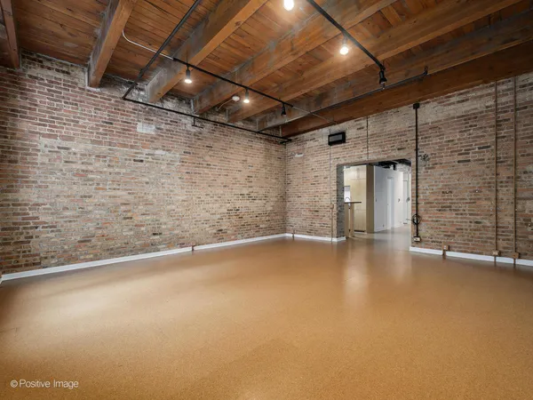 a view of empty room with windows