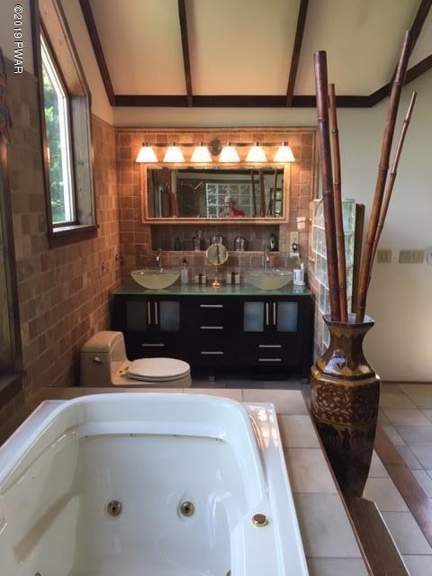 490 Tannery Road Lake Ariel, PA 18436 - Photo 24 of 46 a bathroom with a sink and a large mirror