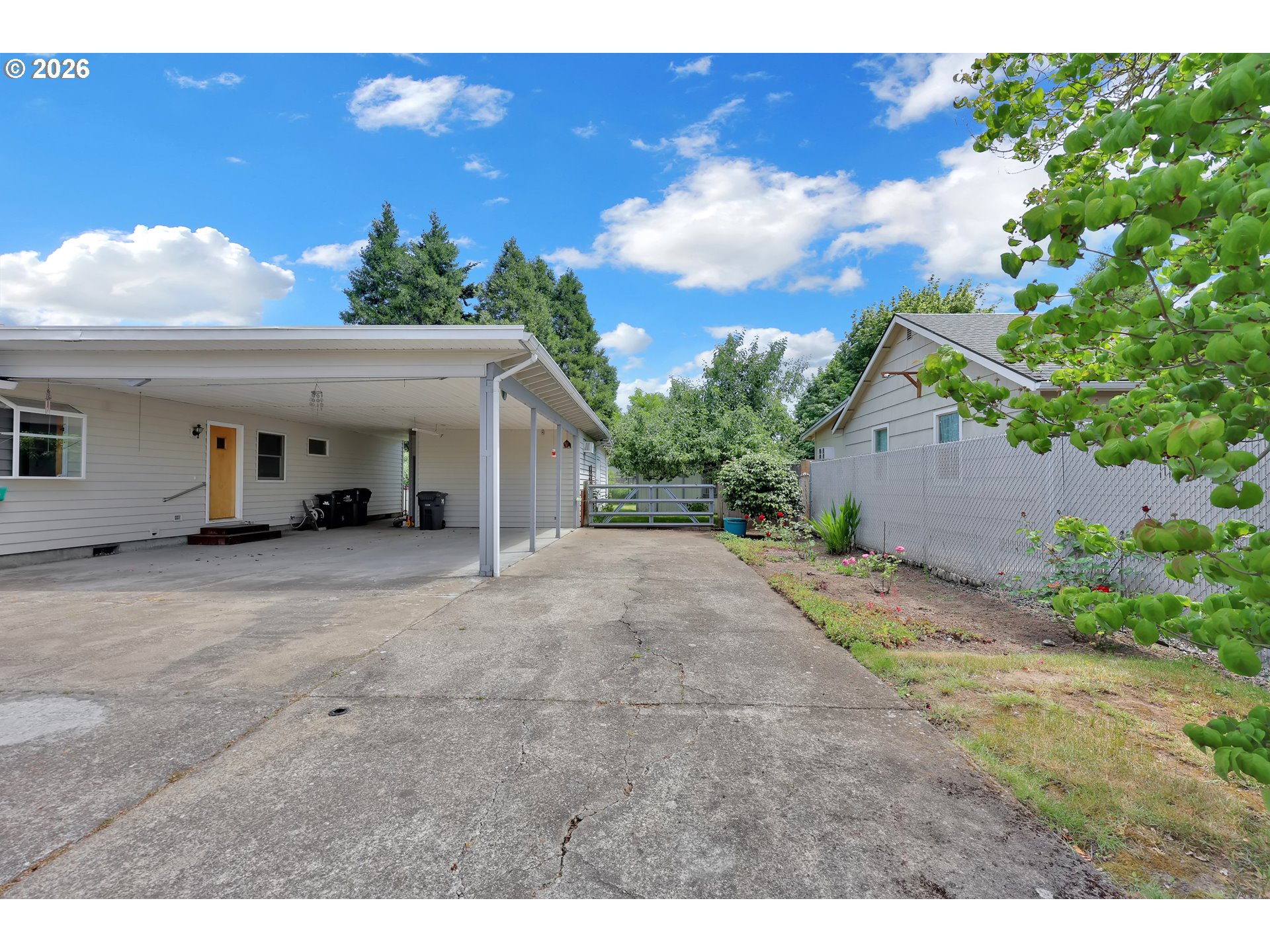 1425 Taney Street Eugene, OR 97402 - Photo 2 of 34 a view of a house with backyard and a tree