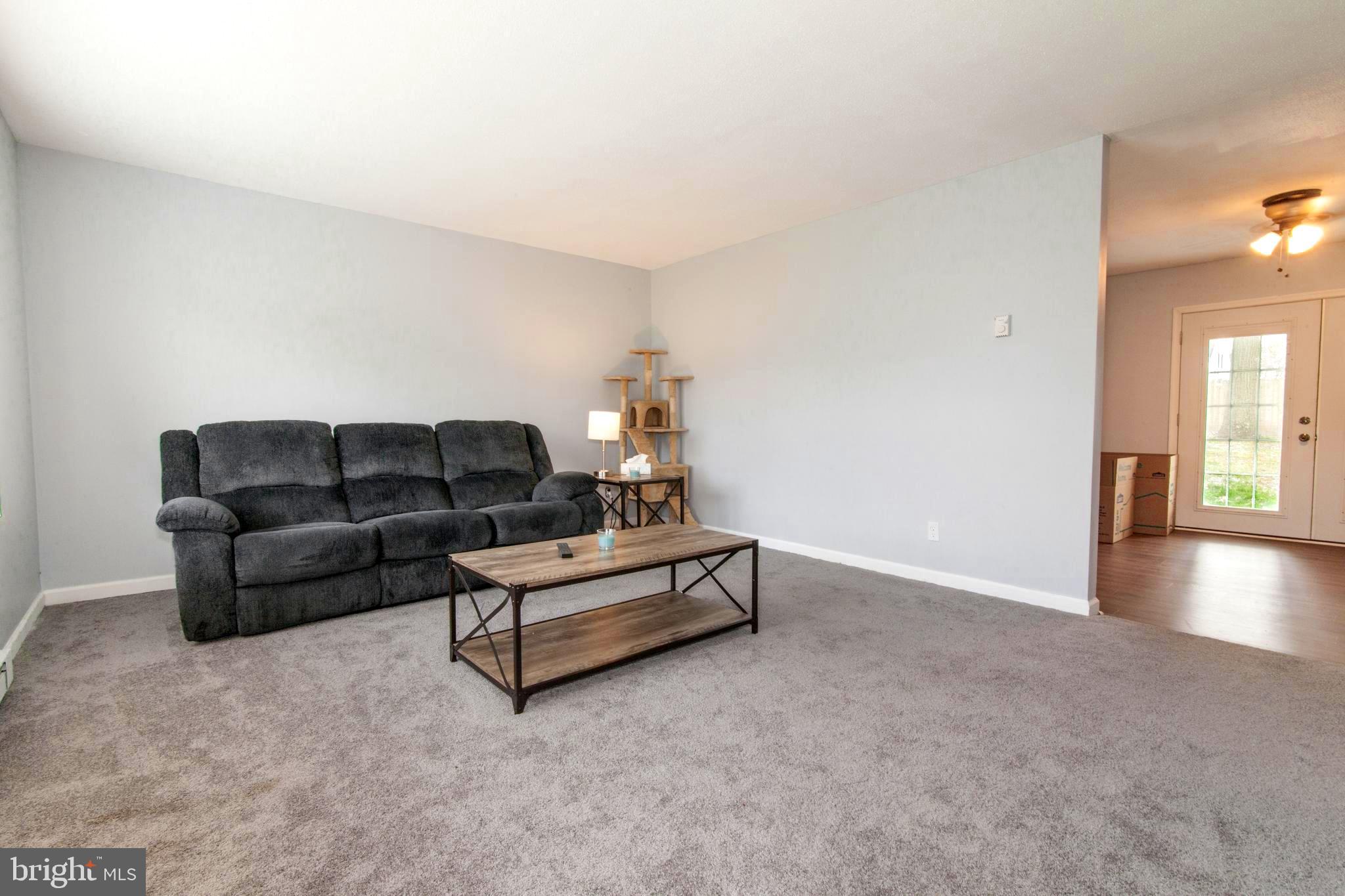 806 Chatfield Road Joppa, MD 21085 - Photo 13 of 28 Large living room w/new carpet and freshly painted