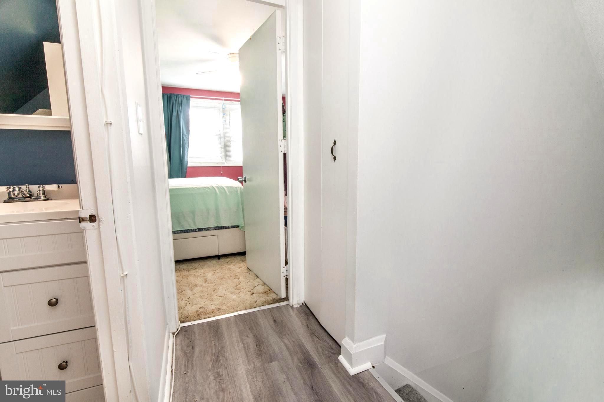 806 Chatfield Road Joppa, MD 21085 - Photo 24 of 28 Upper level hall with new flooring